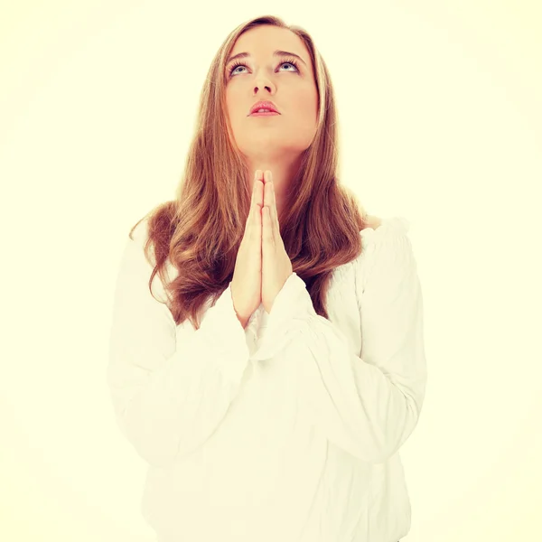 Young caucasian woman praying — Stock Photo, Image