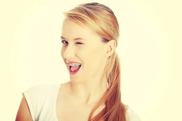 Young student woman with big smile blinking. — Stock Photo, Image