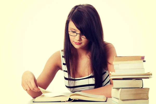 Student with lots of books. — Zdjęcie stockowe