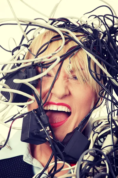 Businesswoman in cables — Stock Photo, Image