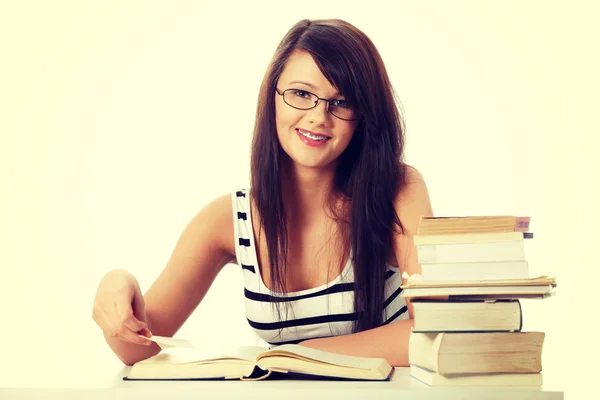 Student with lots of books. Stock Photo