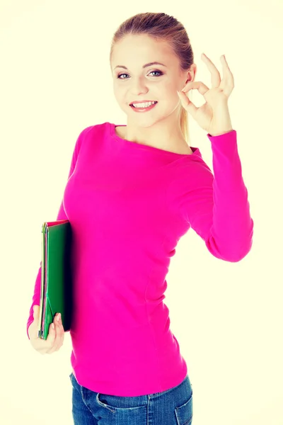 Mujer estudiante mostrando OK gesto . —  Fotos de Stock