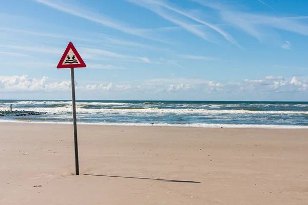 Danger label at the North Sea — Stock Photo, Image