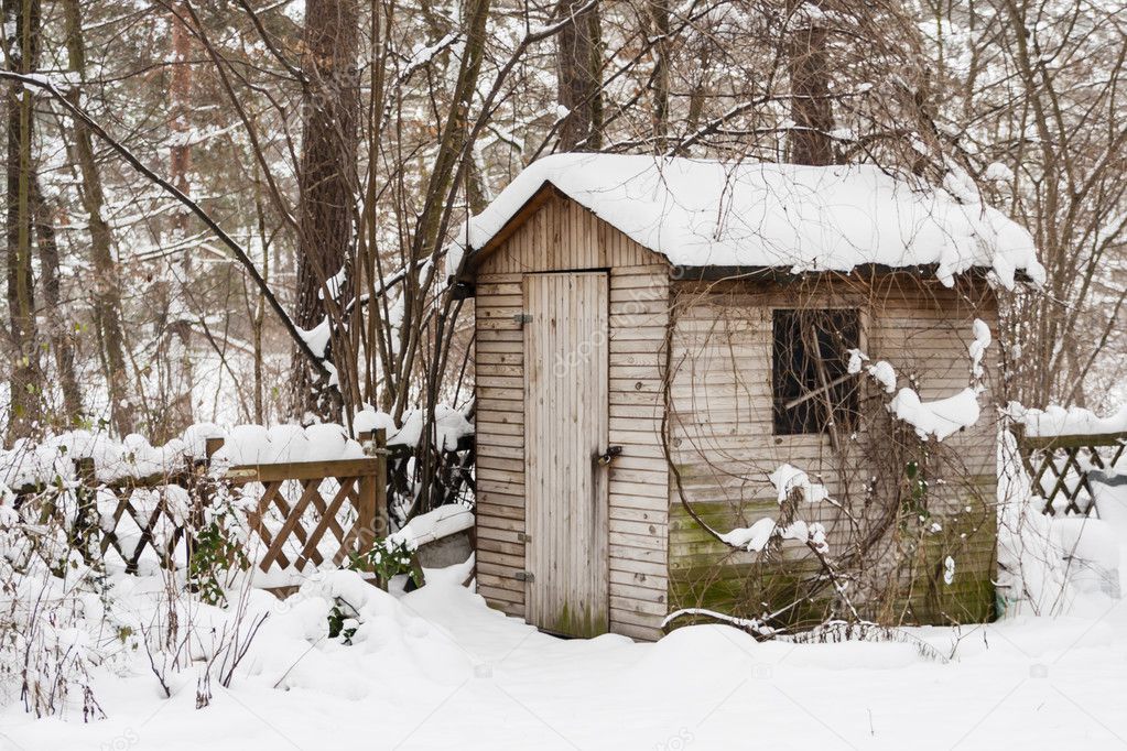 Hut in a garden in winter