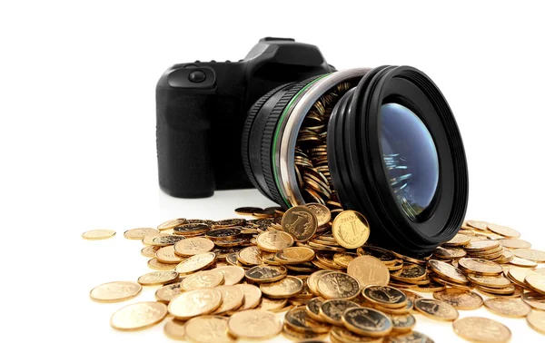 Digital slr camera and golden coins — Stock Photo, Image