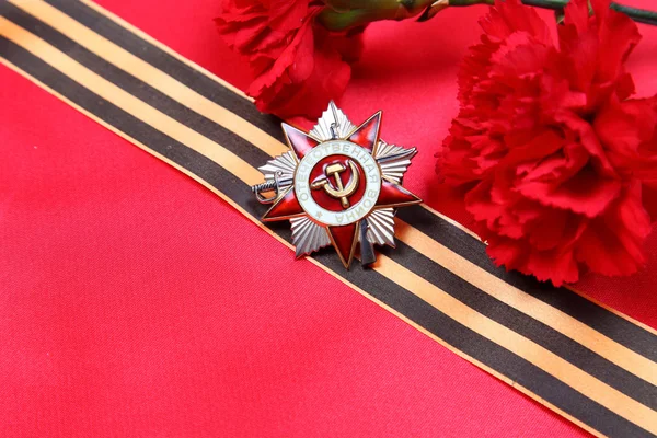 Орден Отечественной войны на Георгиевской ленте — стоковое фото