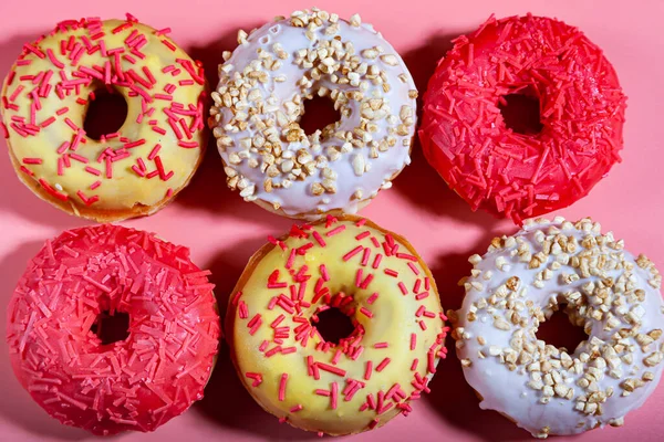 Six Donuts Pink Background Top View — Stock Photo, Image