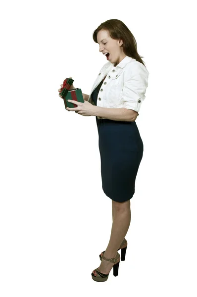 Beautiful woman opening a present — Stock Photo, Image