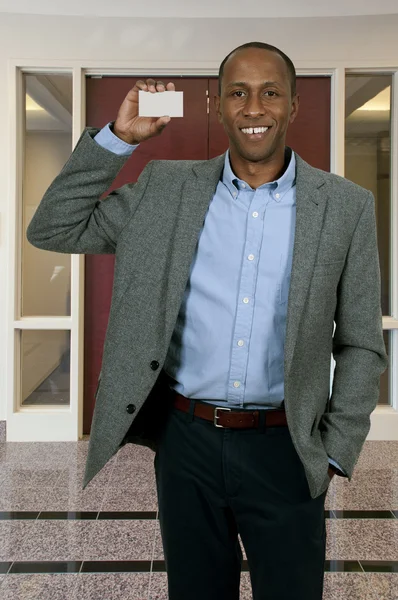 Black Man Holding Business Card — Stock Photo, Image