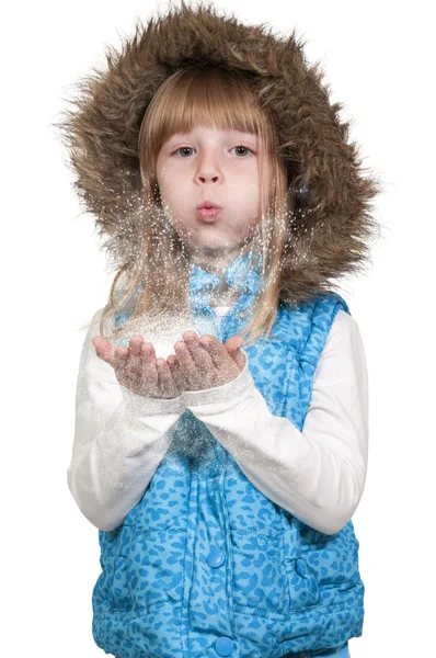 Menina soprando neve — Fotografia de Stock