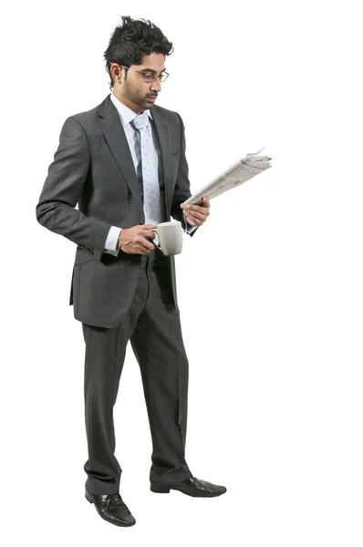 Hombre bebiendo café con periódico — Foto de Stock