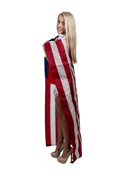 Femme enveloppée dans un drapeau — Photo
