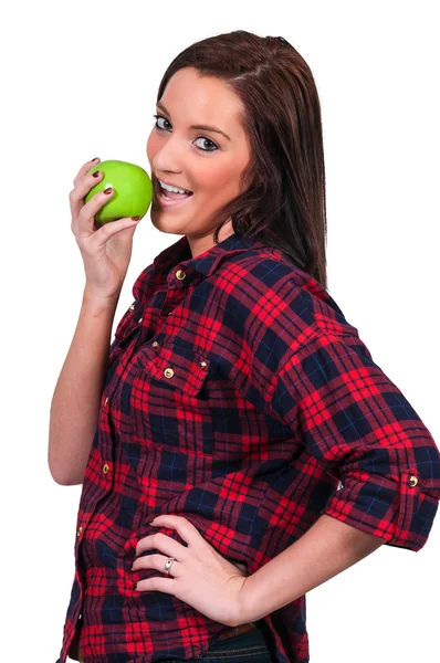 Frau isst einen Apfel — Stockfoto