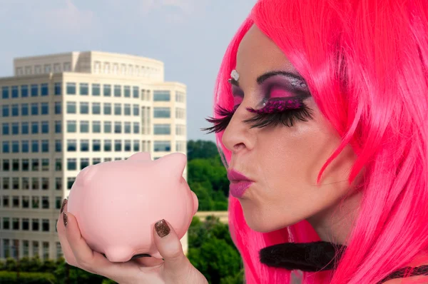 Woman holding piggy bank — Stock Photo, Image