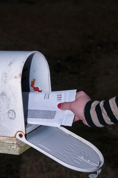 Woman checking the mail — Stock Photo, Image