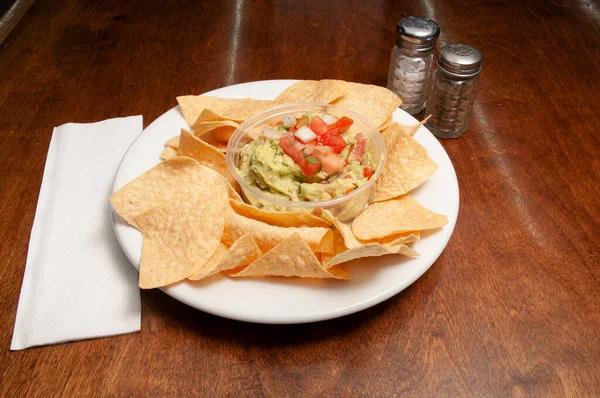 Authentic tex mex mexican cuisine known as guacamole and chips