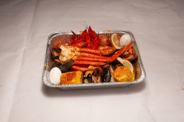 Delicious ocean delicacies known as a family seafood tray