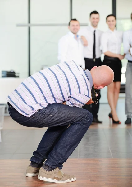 Photographer taking photo of business in office — Stock Photo, Image