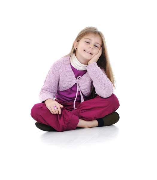 可爱的小女孩坐在地板上的肖像 — 图库照片