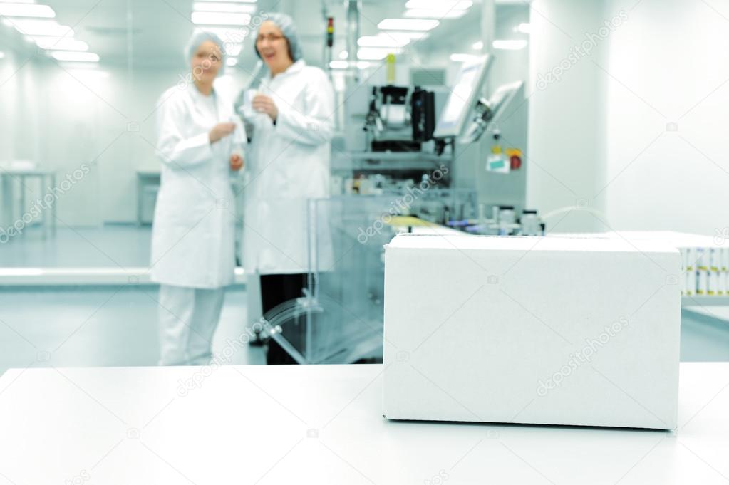 White box at automated production line at modern factory