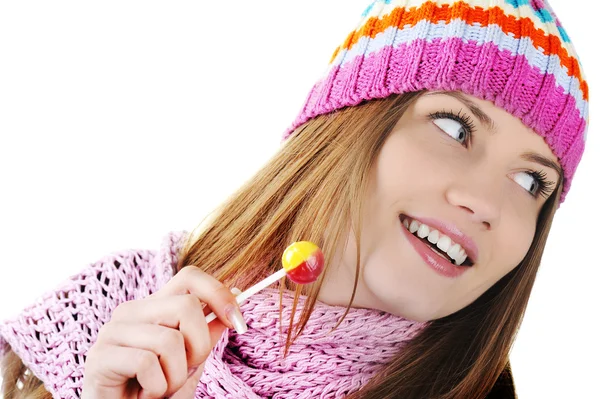 Inverno bella ragazza leccare caramelle — Foto Stock