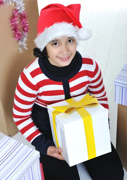 Happy girl with christmas present boxes — Stock Photo, Image