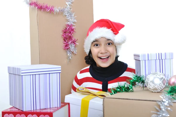 Happy girl with christmas present boxes — Stock Photo, Image