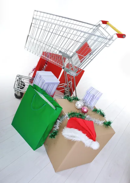 Shopping cart with boxes and bags, happy holidays — Stock Photo, Image