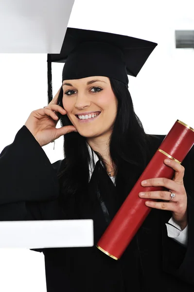 Chica estudiante en un vestido académico, graduación y diploma — Foto de Stock