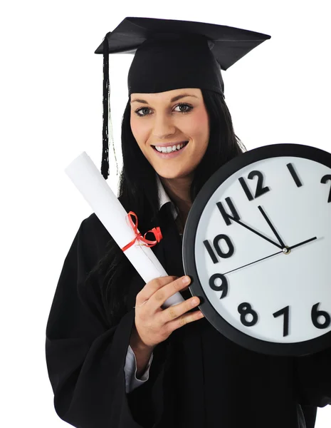 Postgraduální studentka v šatech s diplomem a hodiny — Stock fotografie