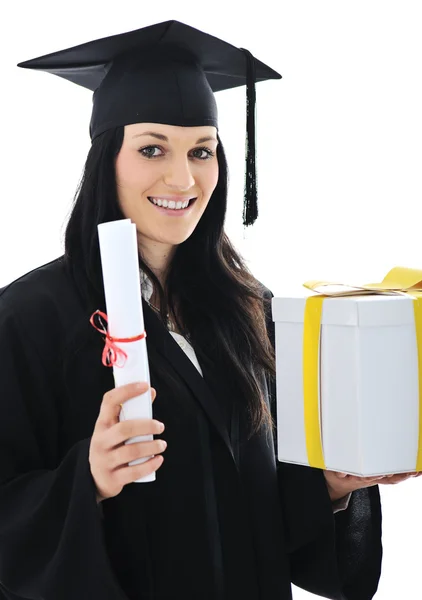 Graduate girl student in gown with diploma and gift — Stock Photo, Image