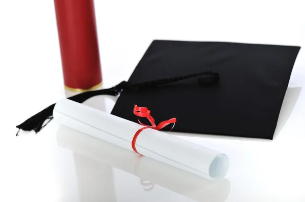 Diplom und Mütze Stockbild