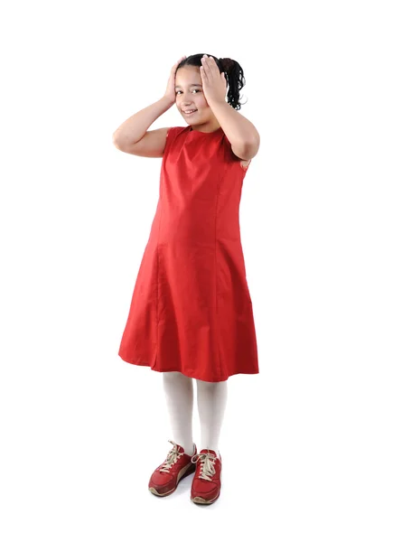 Adorable preteen school girl wearing red dress isolated, posing — Stock Photo, Image