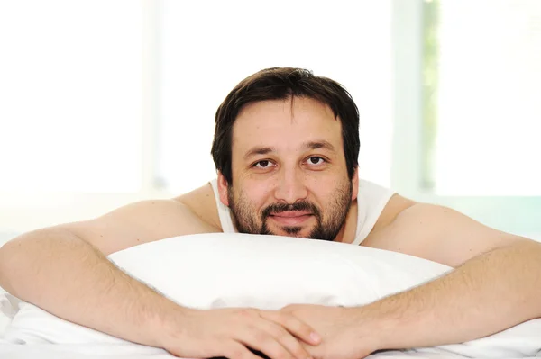 Man in sleeping bed, morning time — Stock Photo, Image