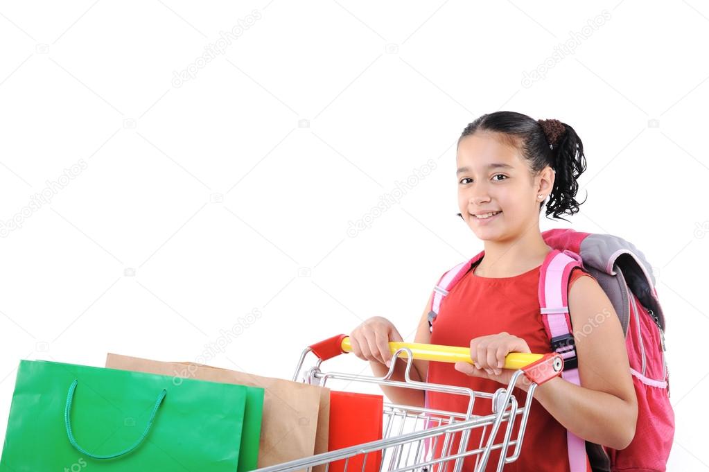 Schoolgirl shopper in red dress with shopping cart