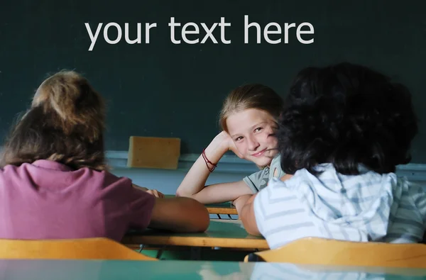 Classroom at school and text on green board — Stock Photo, Image