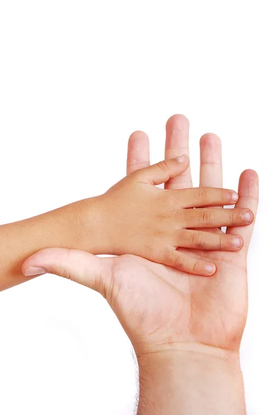 Little hand put on the big one — Stock Photo, Image