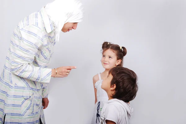 A young muslim woman in traditional clothes in education process — Stock Photo, Image