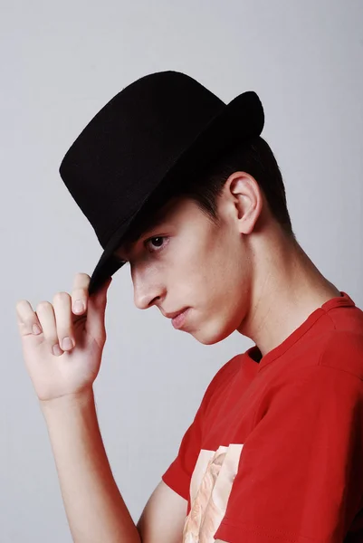 Young male model with hat from profile Stock Photo