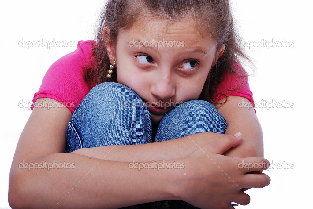Litlle cute girl on ground with emotional expression