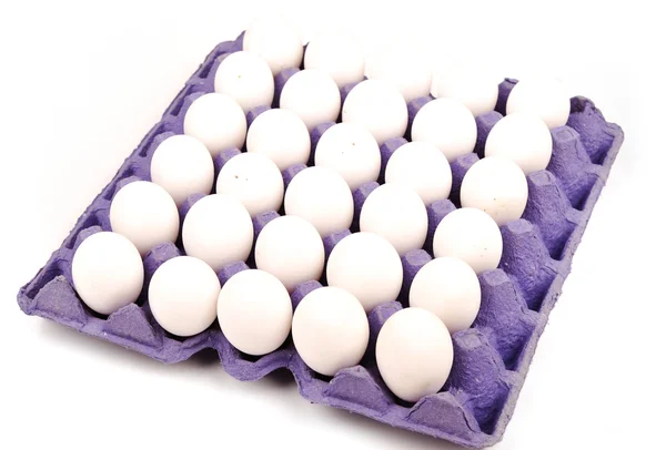 White eggs in the box isolated — Stock Photo, Image