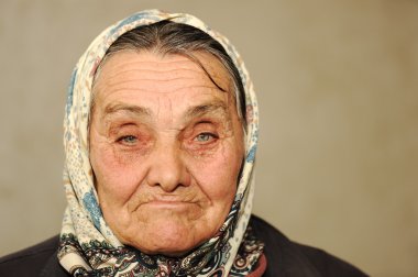 Closeup portrait of elderly serious woman