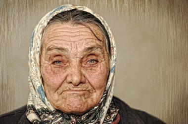 yeşil gözleri ve kafasına eşarp ile olgun bir kadın portresi