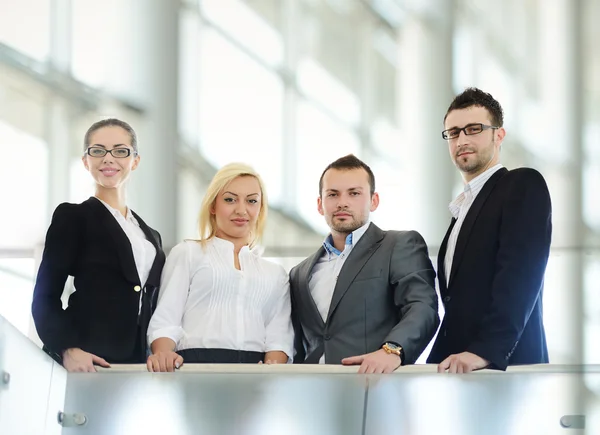 Successful business standing on railing — Stock Photo, Image