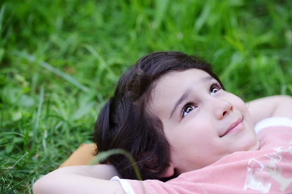 Closeup portrait of a little happy boy outside — Stock Photo, Image