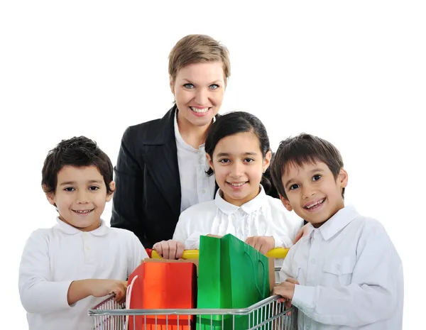 Mãe com filhos em compras — Fotografia de Stock