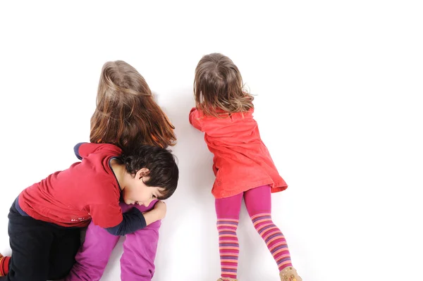 Grupo de niños felices juguetones en el estudio — Foto de Stock