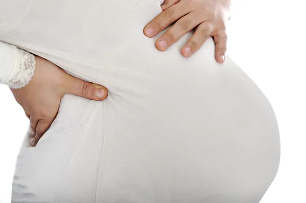 Pregnant woman, pain in back — Stock Photo, Image