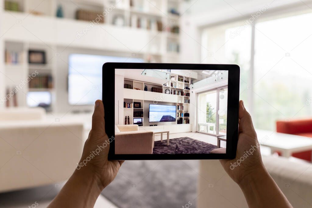 Decorating Apartment with Augmented Reality Interior Design Software. 