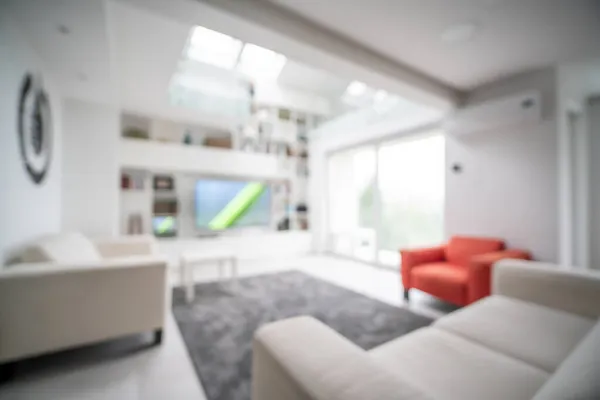 Sofá elegante en el interior de la sala de estar moderna — Foto de Stock